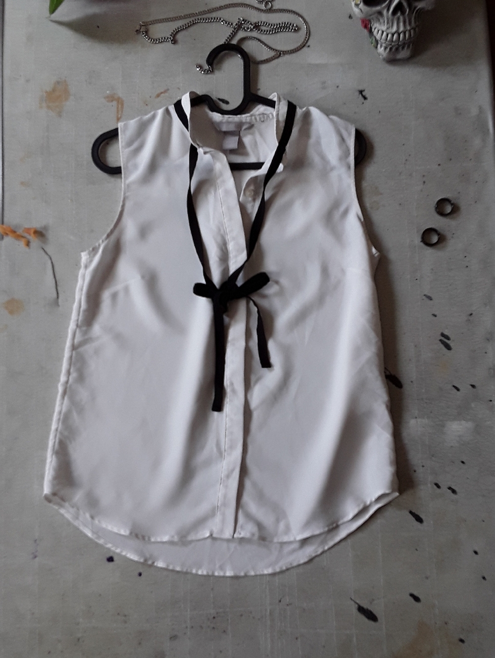 H&M Sleeveless White Blouse with Black Tie Detail